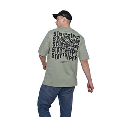 Star Trippy T-Shirt: Light Green, Oversized, Back Model Pose, Bio-Washed Cotton Printed by Techno Be With You