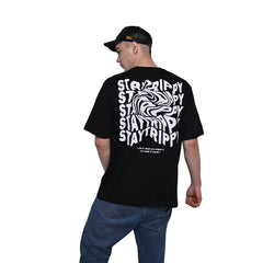 Star Trippy T-Shirt: Black, Oversized, Back Model Pose, Bio-Washed Cotton Printed by Techno Be With You