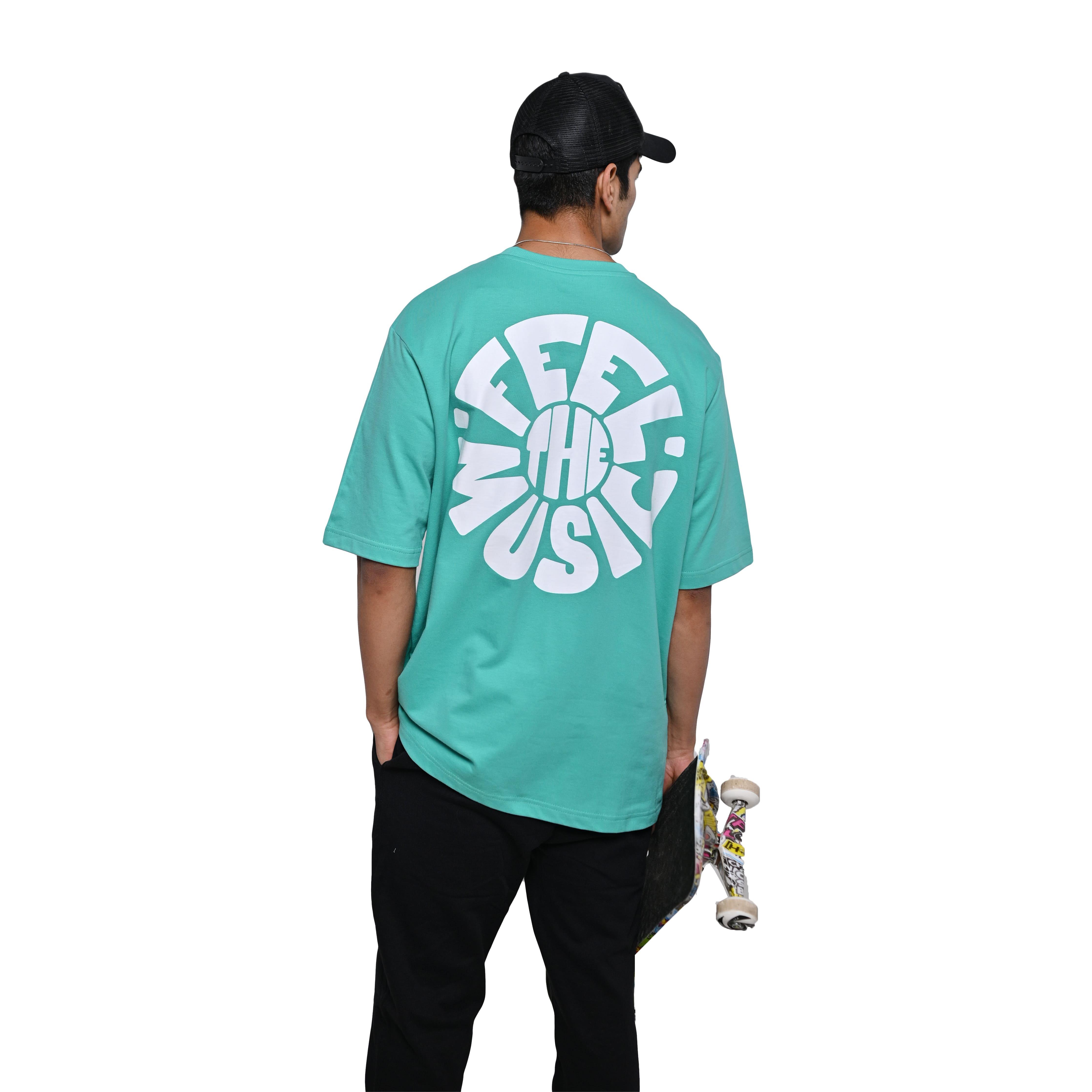 Feel the music T-Shirt: Bright Blue, Oversized, Back Model Pose, Bio-Washed Cotton Printed by Techno Be With You