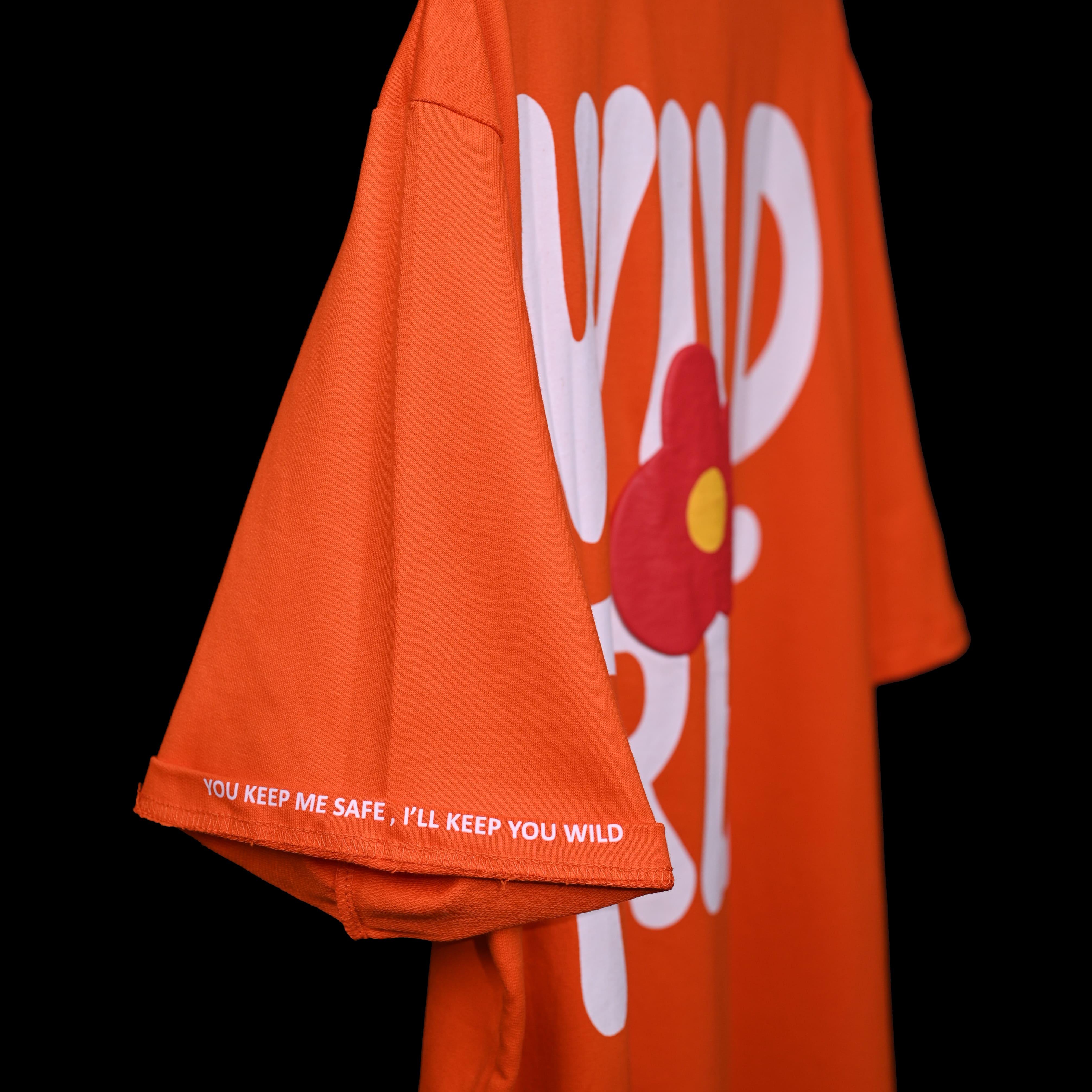 Wild Free T-Shirt: Orange, Oversized, Side View, Bio-Washed Cotton Printed by Techno Be With You