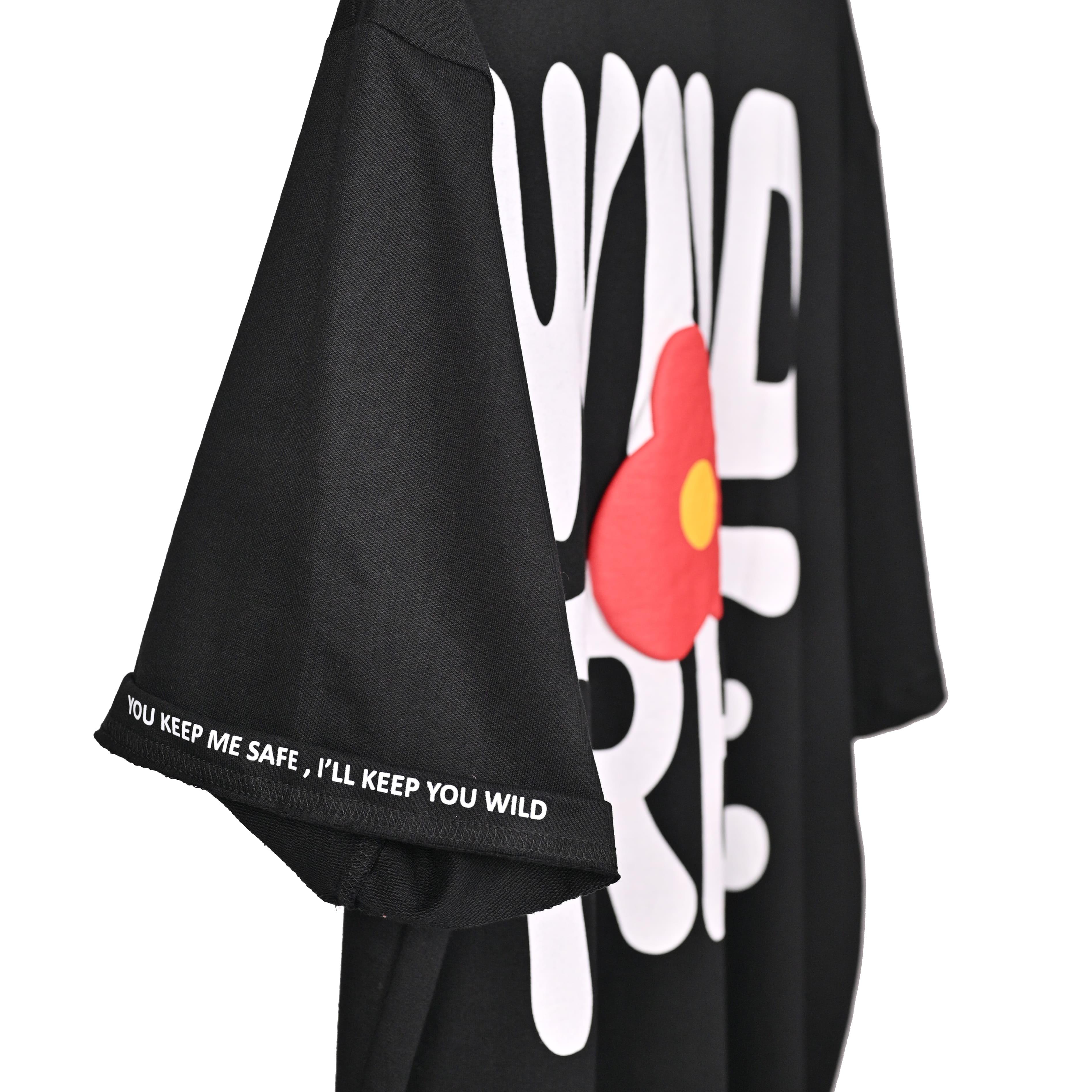 Wild Free T-Shirt: Black, Oversized, Side View, Bio-Washed Cotton Printed by Techno Be With You