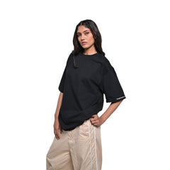 Wild Free T-Shirt: Black, Oversized, Front Model Pose, Bio-Washed Cotton Printed by Techno Be With You