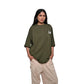 Protect Your Energy T-Shirt: Green, Oversized, Front Model Pose, Bio-Washed Cotton Printed by Techno Be With You