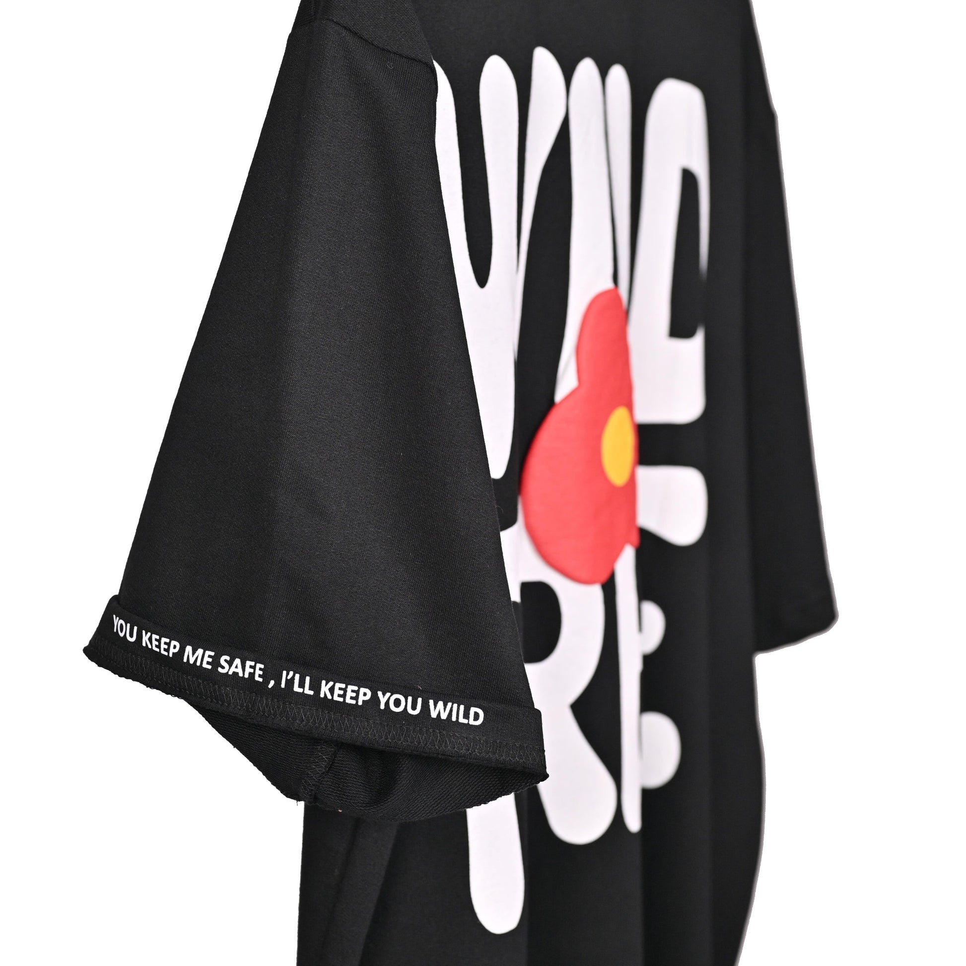 Wild Free T-Shirt: Black, Oversized, Side View, Bio-Washed Cotton Printed by Techno Be With You